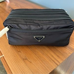 Prada are-Nylon and Saffiano leather travel pouch